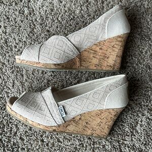 Tom’s Wedge peephole shoes. Size 8M
